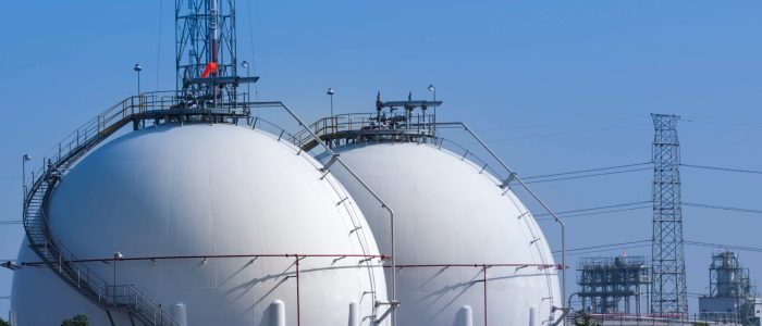 Oil and liquid gas storage tanks in a chemical plant.